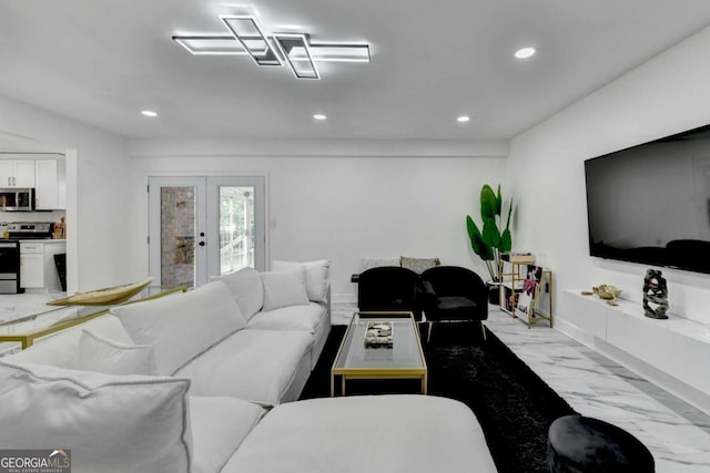 3799 Sweetbriar Cir, Lithia Springs, GA 30122 - living area featuring french doors, recessed lighting, and light marble finish flooring