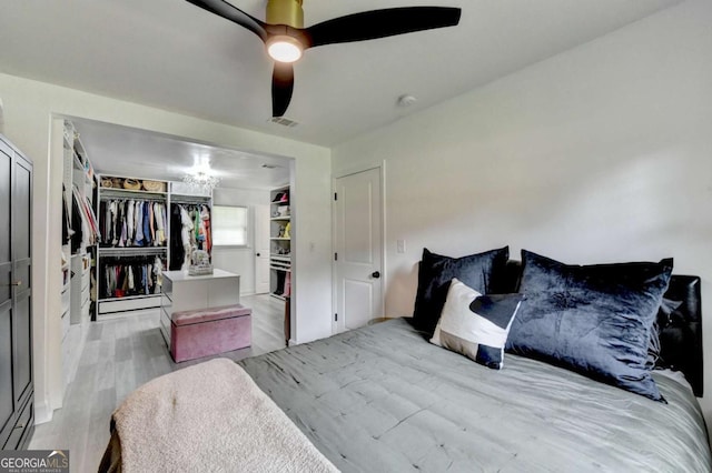 3799 Sweetbriar Cir, Lithia Springs, GA 30122 - bedroom with wood finished floors and a ceiling fan