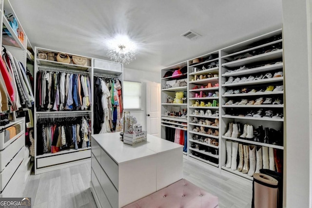 3799 Sweetbriar Cir, Lithia Springs, GA 30122 - walk in closet with light wood-style floors