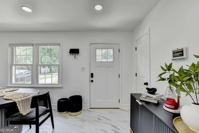 3799 Sweetbriar Cir, Lithia Springs, GA 30122 - foyer featuring light marble finish flooring, recessed lighting, and baseboards