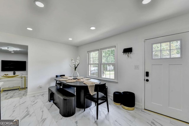 3799 Sweetbriar Cir, Lithia Springs, GA 30122 - dining area with healthy amount of natural light, light marble finish flooring, baseboards, and recessed lighting