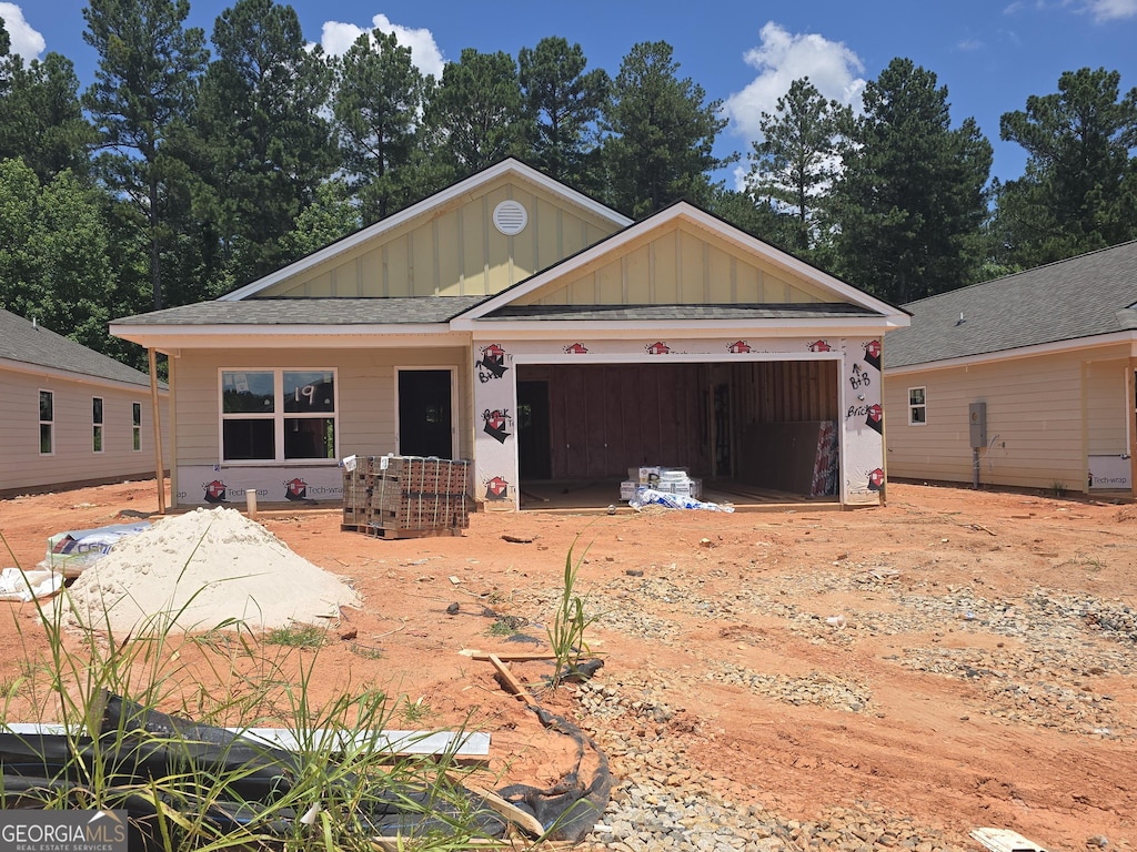 81 Charlie Way Unit 19, Winder, GA 30680 - unfinished property with board and batten siding and an attached garage