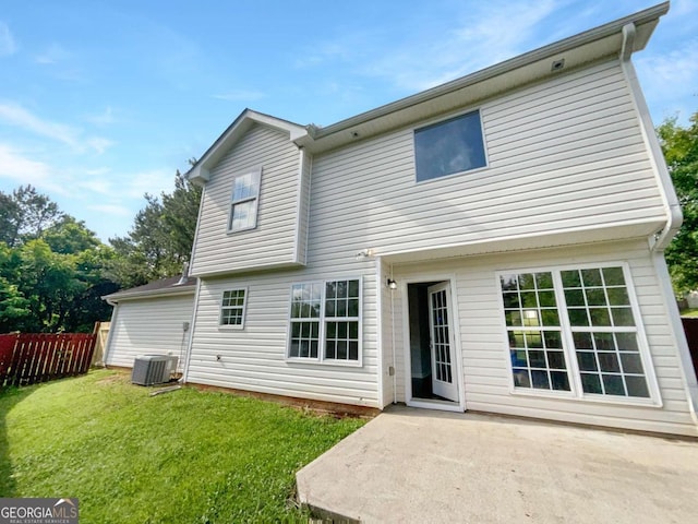 4311 Marci St, Snellville, GA 30039 - rear view of house featuring central air condition unit and a patio area