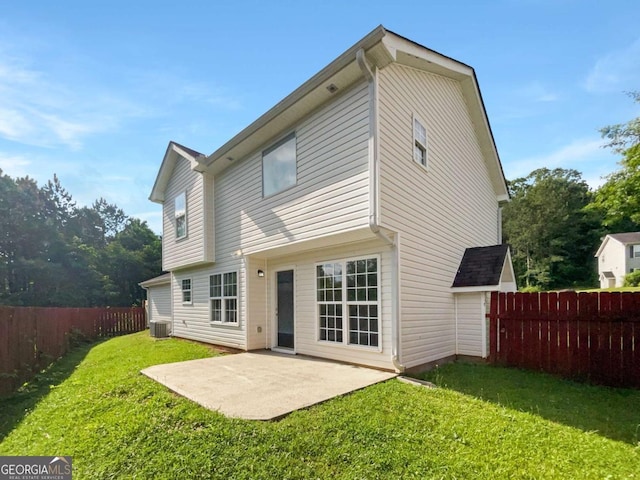 4311 Marci St, Snellville, GA 30039 - rear view of property featuring a patio and central AC unit