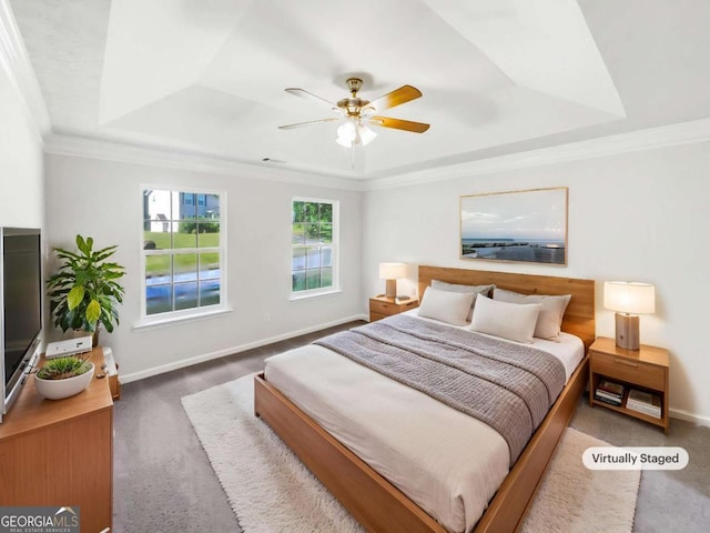 4311 Marci St, Snellville, GA 30039 - carpeted bedroom with a tray ceiling, baseboards, crown molding, and ceiling fan