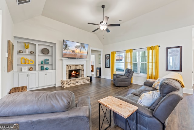 21 Little Creek Dr, Monroe, GA 30655 - living room with lofted ceiling, a ceiling fan, dark wood-type flooring, and a fireplace