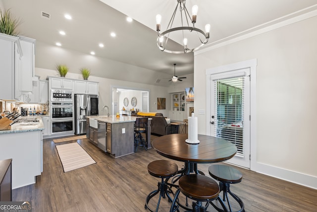 21 Little Creek Dr, Monroe, GA 30655 - dining area featuring dark wood finished floors, a chandelier, a ceiling fan, and recessed lighting