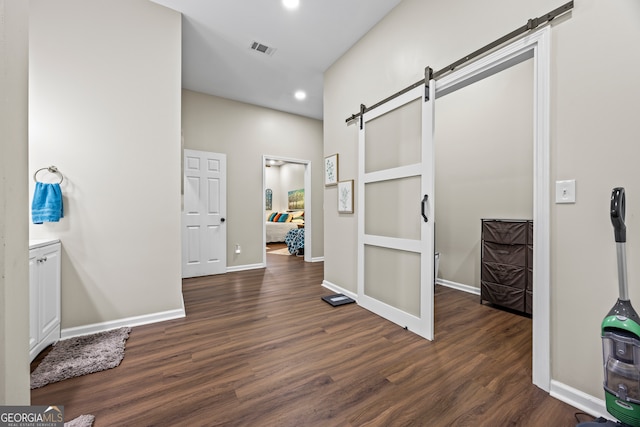21 Little Creek Dr, Monroe, GA 30655 - hallway with a barn door, wood finished floors, and recessed lighting
