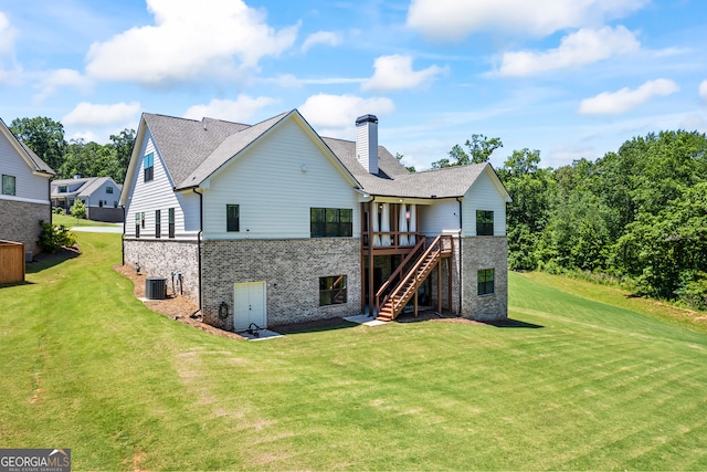 21 Little Creek Dr, Monroe, GA 30655 - rear view of property with stairs, a lawn, a chimney, a wooden deck, and brick siding