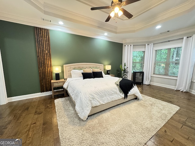 1761 Turtle Pond Dr, Watkinsville, GA 30677 - bedroom featuring dark wood-type flooring, a tray ceiling, crown molding, baseboards, and recessed lighting