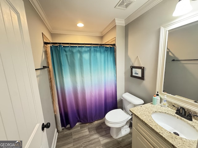 1761 Turtle Pond Dr, Watkinsville, GA 30677 - bathroom with ornamental molding, vanity, toilet, wood finished floors, and recessed lighting