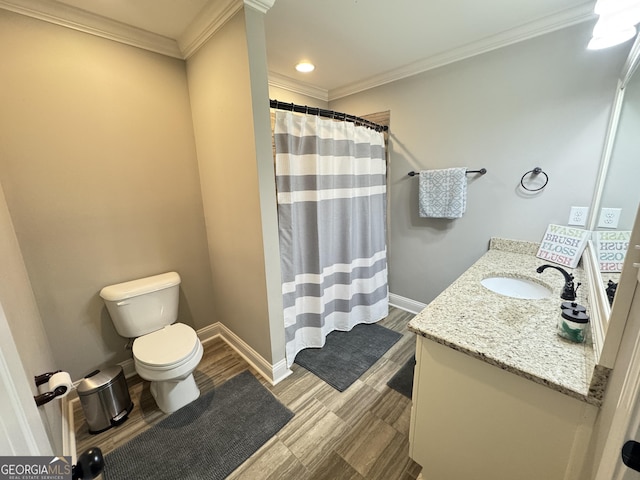 1761 Turtle Pond Dr, Watkinsville, GA 30677 - full bathroom featuring toilet, vanity, wood finished floors, a shower with curtain, and ornamental molding