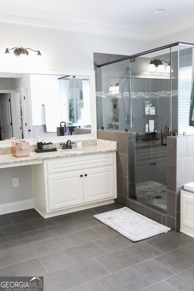 1761 Turtle Pond Dr, Watkinsville, GA 30677 - full bathroom with vanity, a stall shower, ornamental molding, and tile patterned flooring