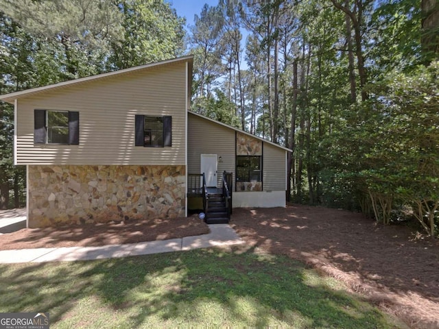 3924 Chimney Ridge Ct, Ellenwood, GA 30294 - view of front facade featuring stone siding