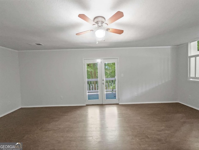 3924 Chimney Ridge Ct, Ellenwood, GA 30294 - spare room with baseboards, a ceiling fan, crown molding, and wood finished floors
