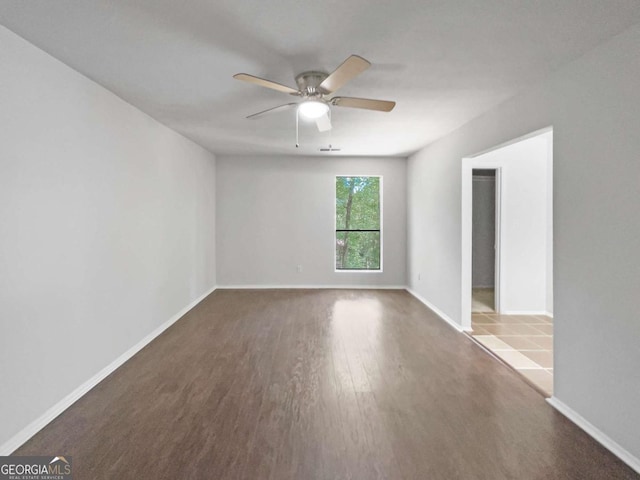 3924 Chimney Ridge Ct, Ellenwood, GA 30294 - spare room with ceiling fan, wood finished floors, and baseboards