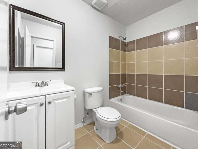 3924 Chimney Ridge Ct, Ellenwood, GA 30294 - full bathroom with toilet, shower / bathtub combination, vanity, tile patterned floors, and baseboards