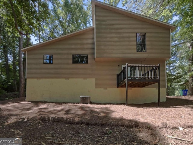 3924 Chimney Ridge Ct, Ellenwood, GA 30294 - view of home's exterior with crawl space and a deck