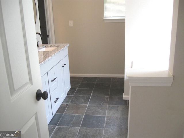 4383 Chestnut Lake Ave, Lithonia, GA 30038 - bathroom featuring vanity and baseboards