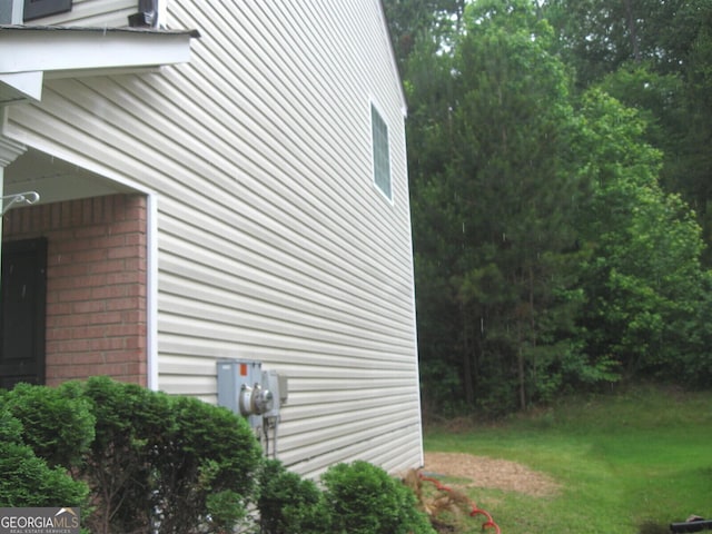 4383 Chestnut Lake Ave, Lithonia, GA 30038 - view of home's exterior featuring brick siding
