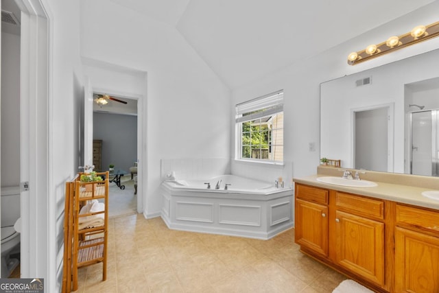 2584 Grayton Loop, Villa Rica, GA 30180 - bathroom with lofted ceiling, toilet, a bath, double vanity, and a shower stall
