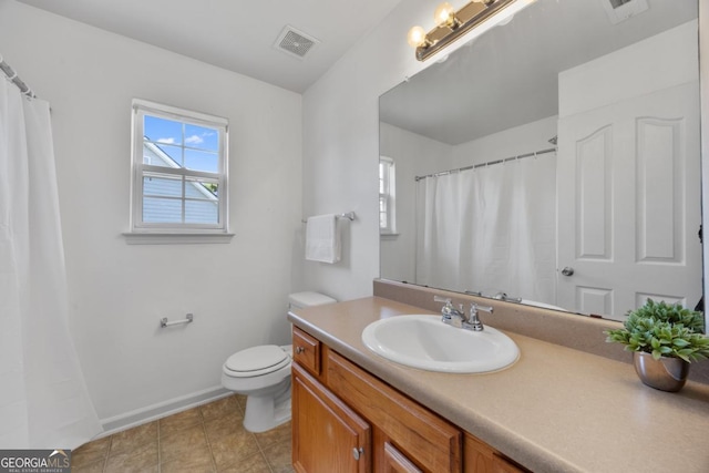 2584 Grayton Loop, Villa Rica, GA 30180 - bathroom featuring vanity, toilet, baseboards, curtained shower, and tile patterned flooring