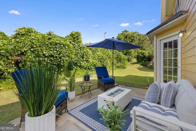 2584 Grayton Loop, Villa Rica, GA 30180 - view of patio / terrace featuring an outdoor living space with a fire pit