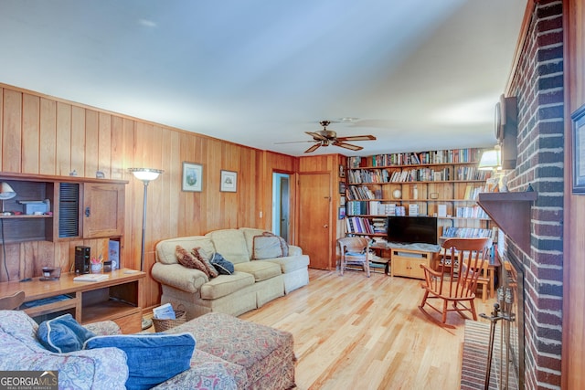 6 Greenleaf Dr SW, Rome, GA 30165 - living area featuring wood walls, wood finished floors, and a ceiling fan