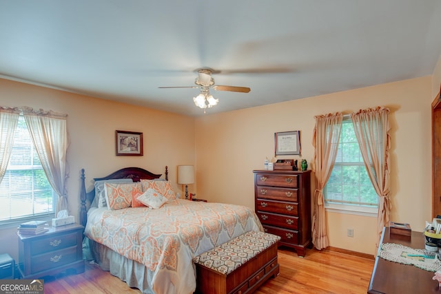 6 Greenleaf Dr SW, Rome, GA 30165 - bedroom featuring multiple windows, light wood-style flooring, ceiling fan, and baseboards