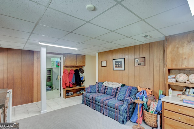 6 Greenleaf Dr SW, Rome, GA 30165 - living area with wooden walls, light tile patterned flooring, and a paneled ceiling