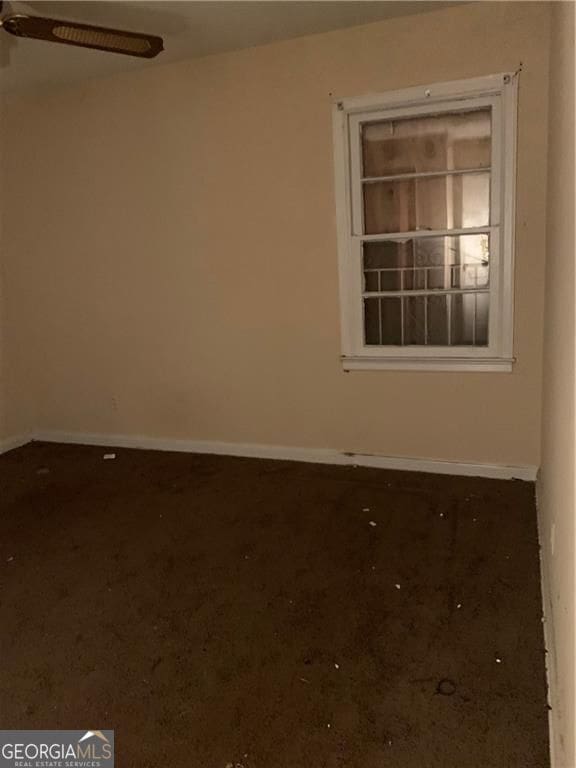 449 Hamilton E Holmes Dr NW, Atlanta, GA 30318 - empty room featuring baseboards, ceiling fan, and carpet flooring