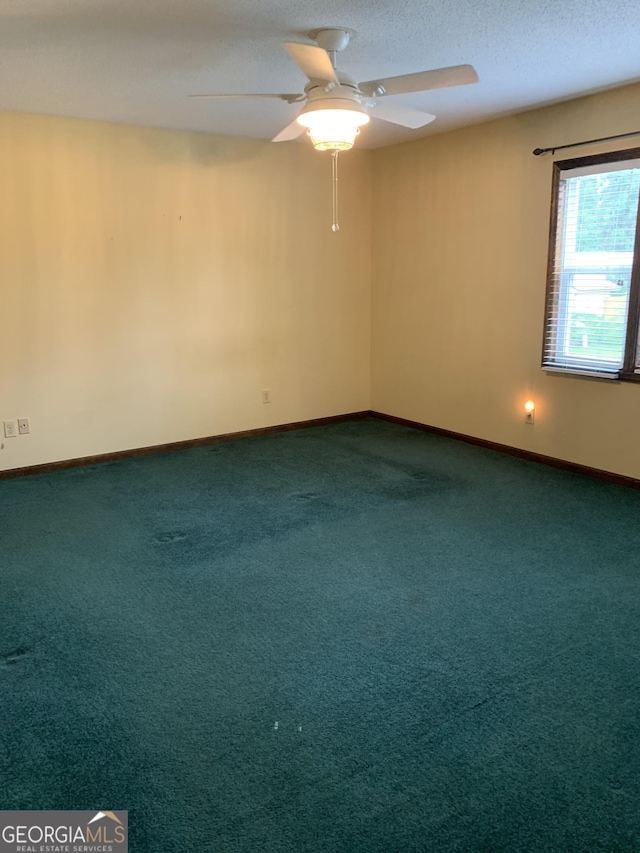 2242 Oakgrove Cir, Valdosta, GA 31602 - unfurnished room featuring a ceiling fan, carpet floors, baseboards, and a textured ceiling