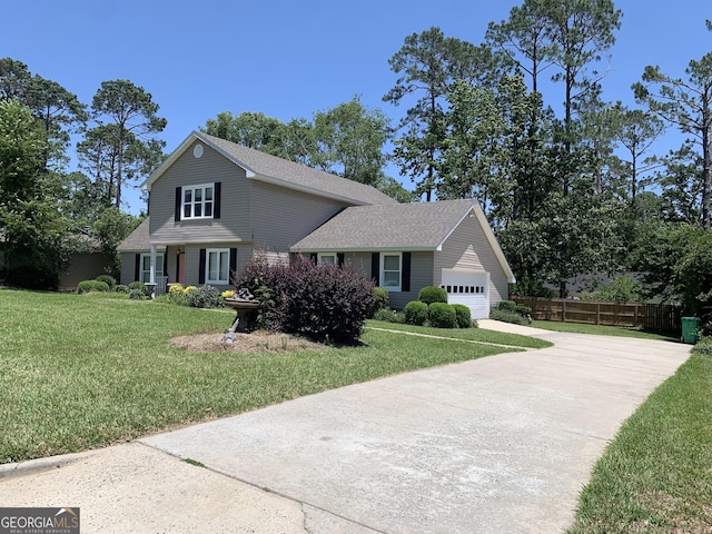 2242 Oakgrove Cir, Valdosta, GA 31602 - traditional-style house with concrete driveway, a garage, and a shingled roof