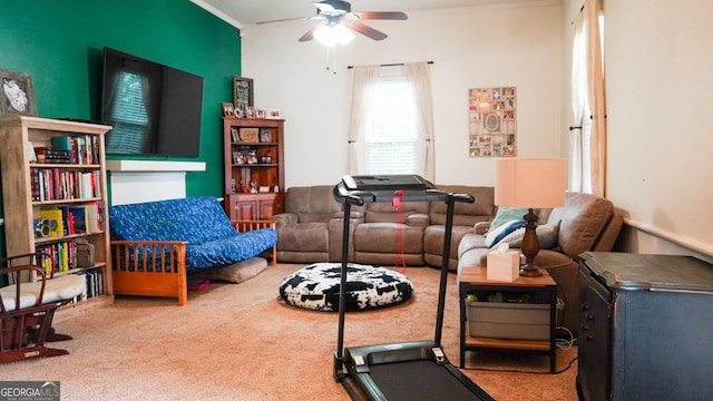 16156 Barnesville St, Zebulon, GA 30295 - carpeted living room featuring a ceiling fan and crown molding