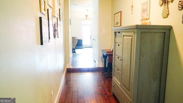 16156 Barnesville St, Zebulon, GA 30295 - hallway featuring dark wood-style floors and baseboards