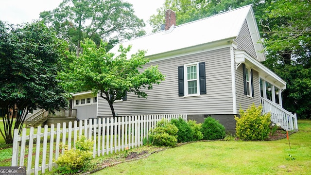 16156 Barnesville St, Zebulon, GA 30295 - view of property exterior with stairway and a chimney