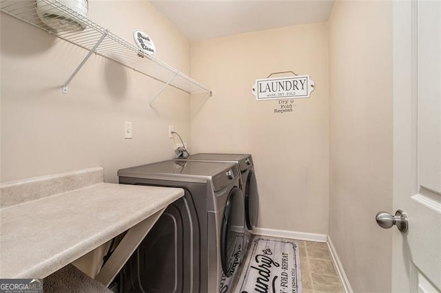 230 Haleys Ct, Woodstock, GA 30188 - washroom with washer and clothes dryer, baseboards, and tile patterned floors