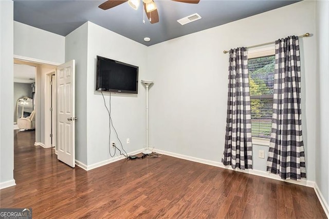 230 Haleys Ct, Woodstock, GA 30188 - empty room with a ceiling fan, wood finished floors, and baseboards