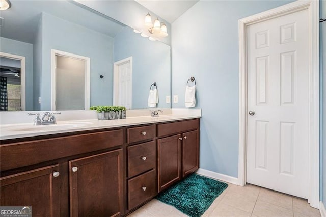 230 Haleys Ct, Woodstock, GA 30188 - bathroom with double vanity, tile patterned flooring, and baseboards