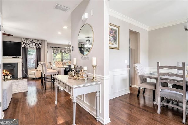 230 Haleys Ct, Woodstock, GA 30188 - dining area featuring wood finished floors, ceiling fan, a warm lit fireplace, a wainscoted wall, and recessed lighting
