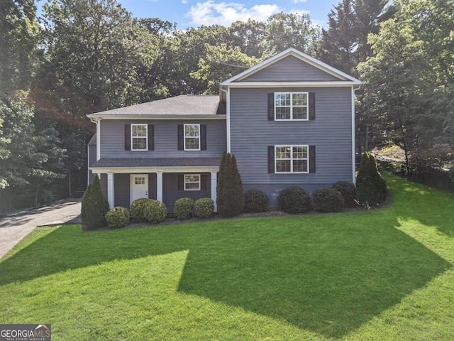 2067 Kinridge Ct, Marietta, GA 30062 - traditional-style house featuring a front lawn and driveway