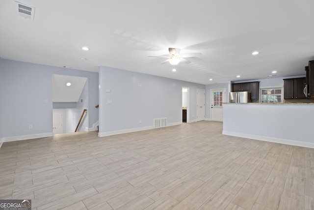 2067 Kinridge Ct, Marietta, GA 30062 - unfurnished living room with a ceiling fan, recessed lighting, baseboards, light wood-type flooring, and stairway