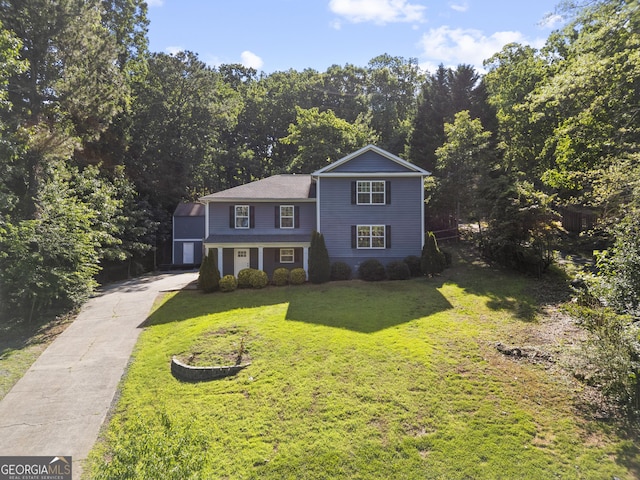 2067 Kinridge Ct, Marietta, GA 30062 - traditional-style house featuring a front yard and concrete driveway