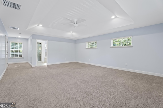 2067 Kinridge Ct, Marietta, GA 30062 - unfurnished room with a raised ceiling, recessed lighting, baseboards, a ceiling fan, and healthy amount of natural light