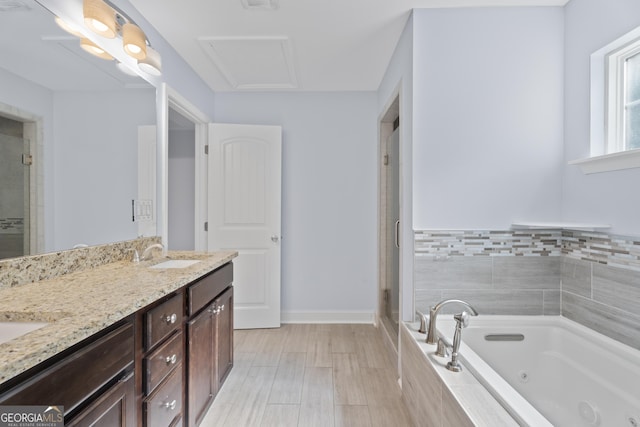 2067 Kinridge Ct, Marietta, GA 30062 - full bathroom featuring a stall shower, a tub with jets, double vanity, and baseboards
