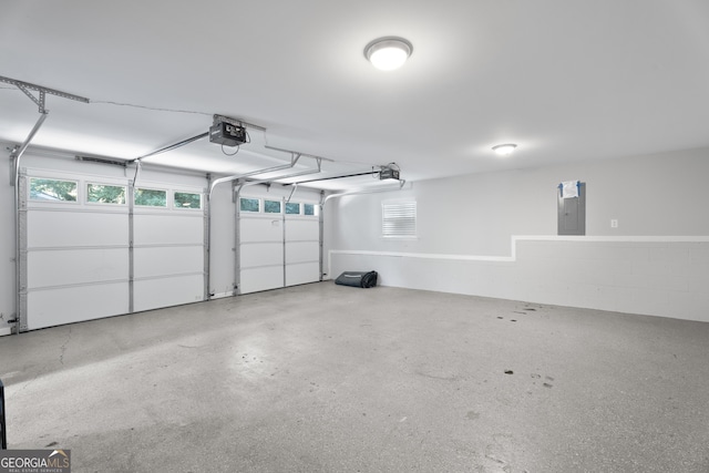 2067 Kinridge Ct, Marietta, GA 30062 - garage with electric panel and a garage door opener