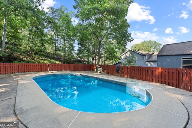 2067 Kinridge Ct, Marietta, GA 30062 - view of swimming pool with a fenced backyard