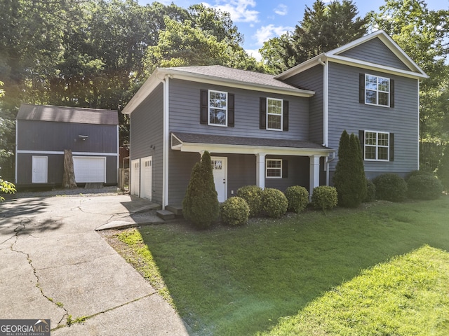 2067 Kinridge Ct, Marietta, GA 30062 - traditional-style house with concrete driveway, a front yard, a garage, and covered porch