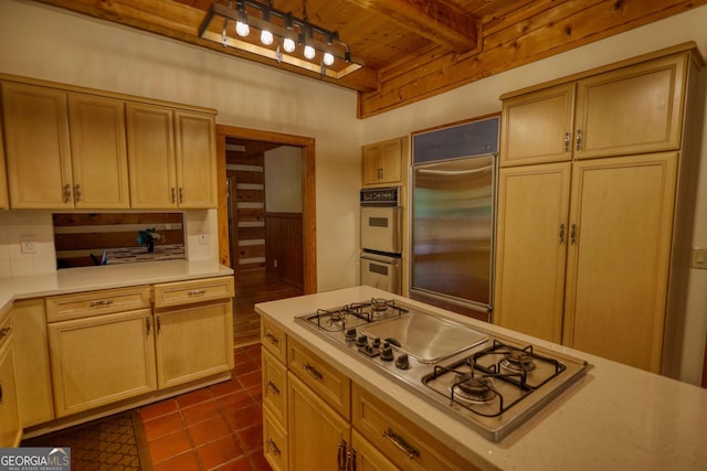2905 Cammie Wages Rd, Dacula, GA 30019 - kitchen featuring appliances with stainless steel finishes, wood ceiling with exposed beams, light countertops, and dark tile patterned flooring
