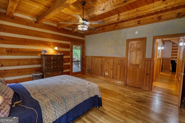 2905 Cammie Wages Rd, Dacula, GA 30019 - bedroom with wooden ceiling with exposed beams, wood finished floors, wainscoting, and ceiling fan
